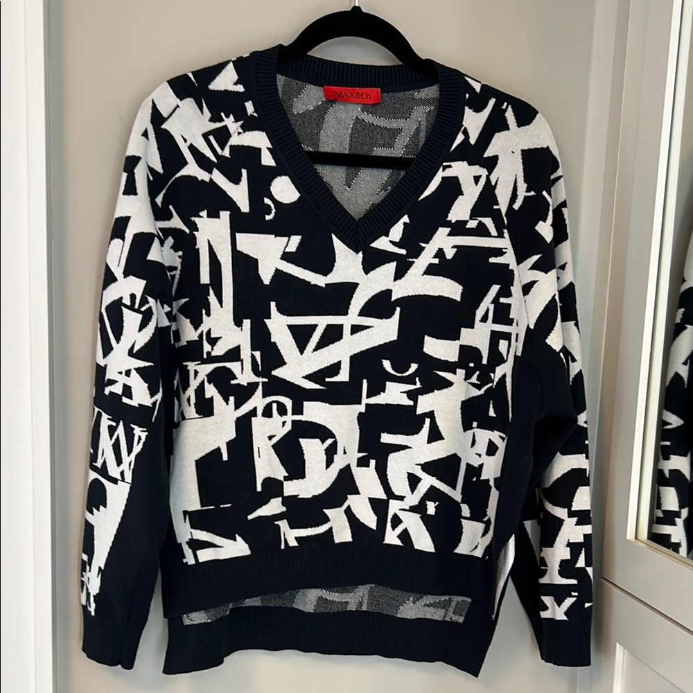 Vince Black and White V-Neck Sweater with Geometric Design